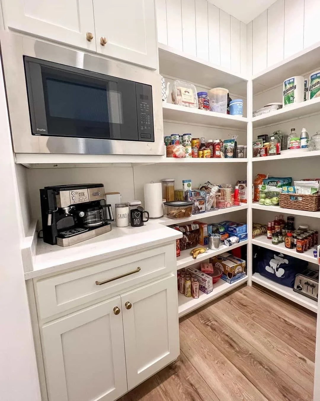 Minimalist walk-in pantry ideas with sleek cabinets and bright lighting