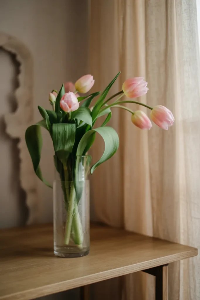 A casual wildflower meadow bouquet in a rustic jar.