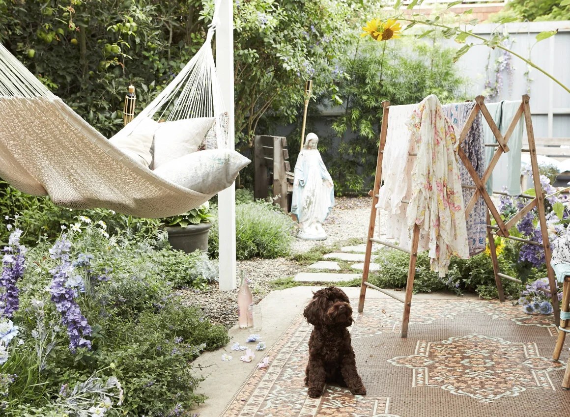 Vibrant outdoor rugs anchoring seating areas with warmth
