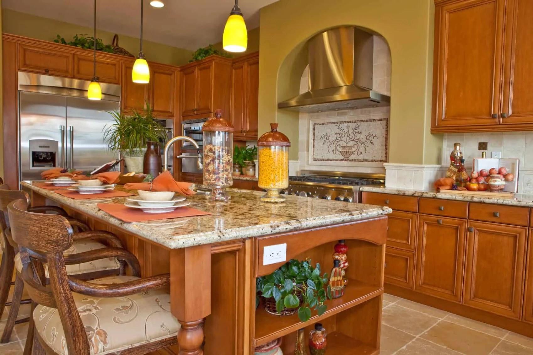 Vintage glam kitchen island with retro colors and marble