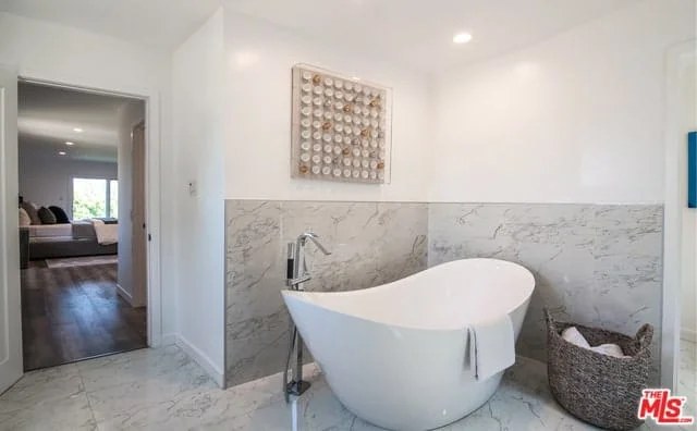 Ocean-inspired bathroom decorated with sea glass accents.