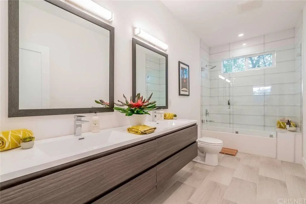 Bold black and white bathroom with striking geometric patterns.