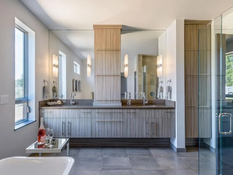 Colorful kids bathroom with functional storage and playful design.