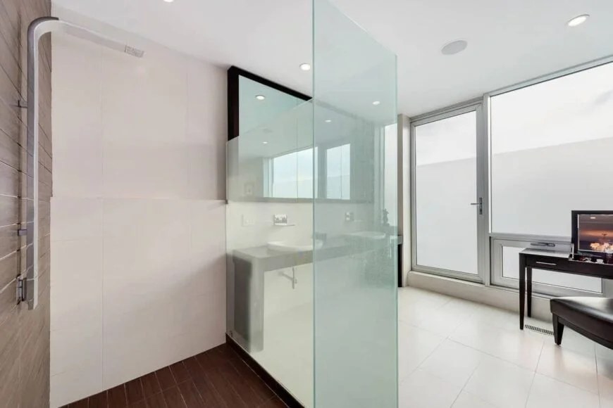 Contemporary bathroom featuring elegant glass walk-in shower.