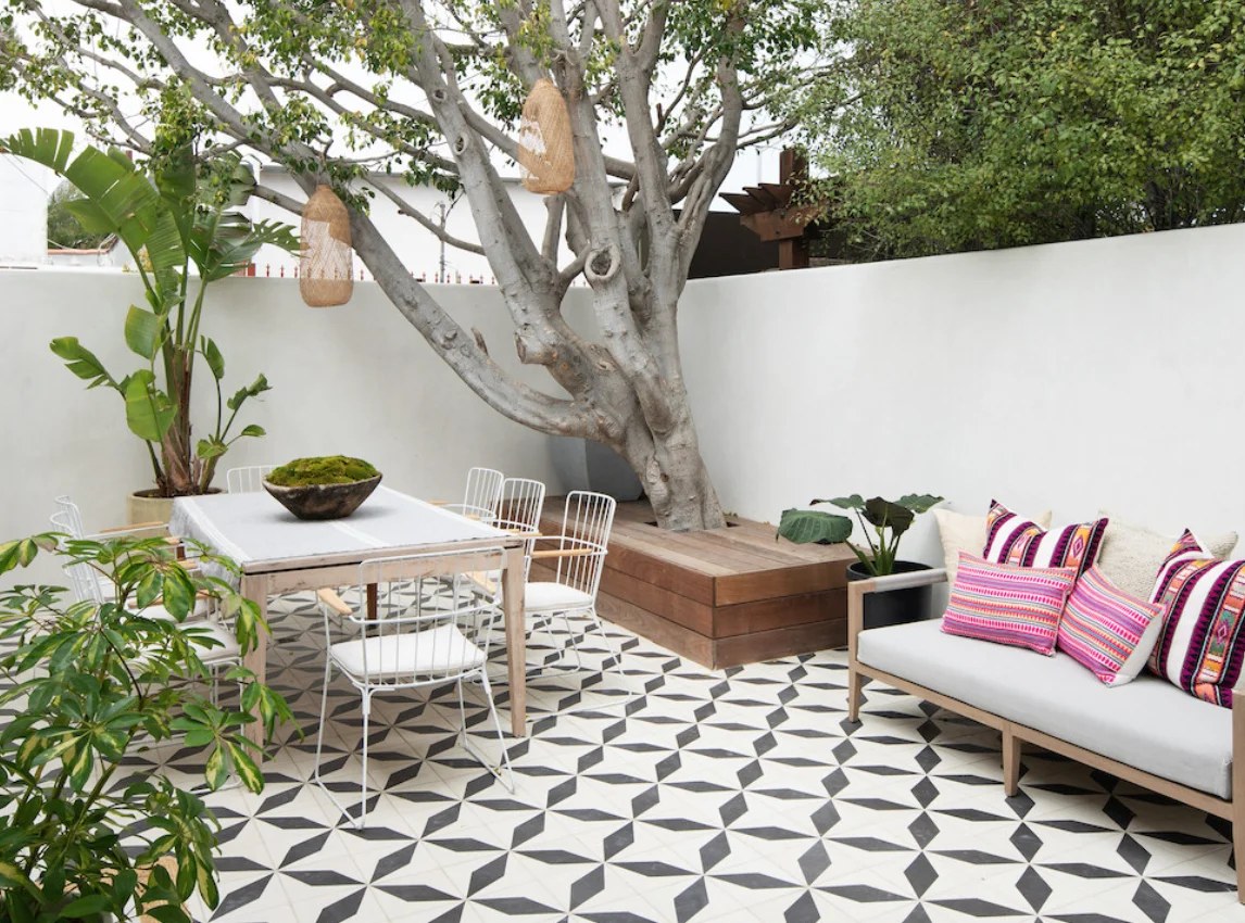 Brightly colored textiles enhancing cozy bohemian backyard ideas