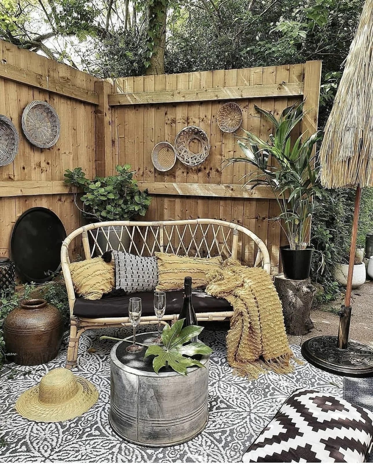 Bright outdoor rug defining a cozy seating area